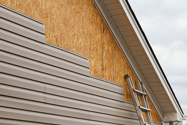 Professional Siding Replacement technician working in Arlington, TN